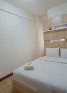 BEDROOM Classic and Tidy 2BR at Vida View Makassar Apartment By Travelio