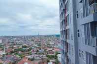 Nearby View and Attractions Classic and Tidy 2BR at Vida View Makassar Apartment By Travelio