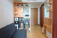 Sảnh chờ Classic and Tidy 2BR at Vida View Makassar Apartment By Travelio