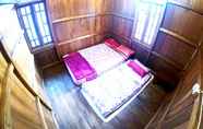Phòng ngủ 5 Degolan Wooden House Homestay Jogja unit 1
