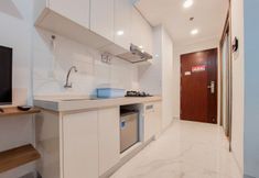 공용 공간 5 Homey and Warm Studio Apartment at Sky House BSD By Travelio