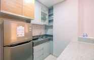 Common Space 5 Full Furnished Cozy Design 2BR Apartment Transpark Cibubur By Travelio
