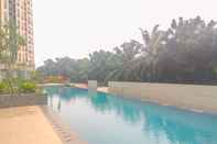 Swimming Pool Full Furnished Cozy Design 2BR Apartment Transpark Cibubur By Travelio