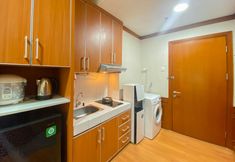 Ruang Umum 4 Minimalist and Comfy 1BR Apartment at Woodland Park Residence By Travelio