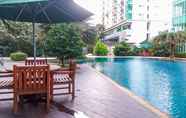 Swimming Pool 7 Minimalist and Comfy 1BR Apartment at Woodland Park Residence By Travelio