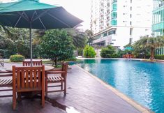 Kolam Renang 7 Minimalist and Comfy 1BR Apartment at Woodland Park Residence By Travelio