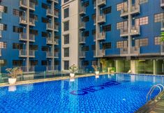 Swimming Pool 2 Comfy Studio Apartment at 2nd Floor Evenciio Margonda By Travelio
