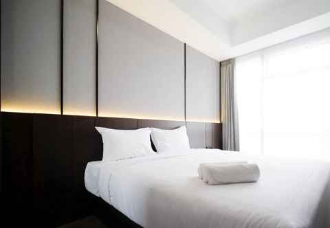 Bedroom Spacious and Tidy 2BR at Grand Sungkono Lagoon Apartment By Travelio