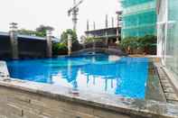 Swimming Pool Spacious and Tidy 2BR at Grand Sungkono Lagoon Apartment By Travelio