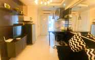 Common Space 4 Comfortable and Great Deal 2BR at Bassura City Apartment By Travelio