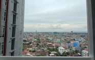 Nearby View and Attractions 7 Comfortable and Spacious 3BR Vida View Makassar Apartment By Travelio