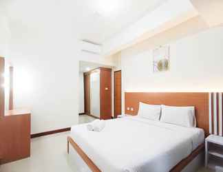 Bedroom 2 Comfortable and Spacious 3BR Vida View Makassar Apartment By Travelio