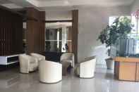 Lobby Good Deal and Tidy Studio at Pinewood Apartment By Travelio