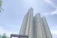 Exterior Tranquil Stay and Simply 2BR at Osaka Riverview PIK 2 Apartment By Travelio