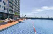 Kolam Renang 4 Tranquil Stay and Simply 2BR at Osaka Riverview PIK 2 Apartment By Travelio