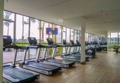 Fitness Center 7 Elegant and Warm 1BR Apartment at Gold Coast By Travelio