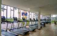 Fitness Center 7 Elegant and Warm 1BR Apartment at Gold Coast By Travelio