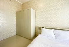 Bedroom 2 Restful and Elegant 1BR at 35th Floor Vasanta Innopark Apartment By Travelio