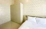 Bedroom 2 Restful and Elegant 1BR at 35th Floor Vasanta Innopark Apartment By Travelio