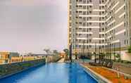 Swimming Pool 7 Restful and Elegant 1BR at 35th Floor Vasanta Innopark Apartment By Travelio