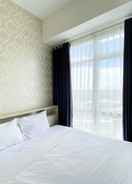 BEDROOM Restful and Elegant 1BR at 35th Floor Vasanta Innopark Apartment By Travelio