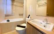 Toilet Kamar 7 Minimalist and Cozy 2BR at 8th Floor The Oasis Cikarang Apartment By Travelio