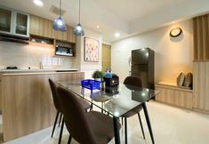 พื้นที่สาธารณะ 5 Minimalist and Cozy 2BR at 8th Floor The Oasis Cikarang Apartment By Travelio