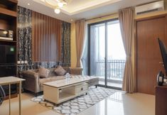 Common Space 3 Spacious and Homey 2BR at Samara Suites Apartment By Travelio