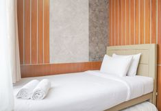 Bedroom 2 Spacious and Homey 2BR at Samara Suites Apartment By Travelio