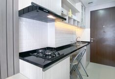 Common Space 3 Cozy Living and Simple Studio Transpark Cibubur Apartment By Travelio