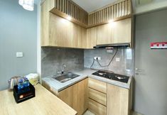 Common Space 5 Comfort and Simply Look 1BR Vasanta Innopark Apartment By Travelio