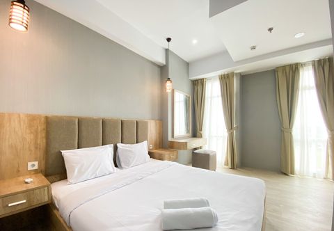Bedroom Comfort and Simply Look 1BR Vasanta Innopark Apartment By Travelio
