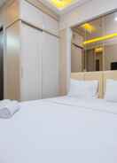 BEDROOM Nice and Cozy Studio at Transpark Cibubur Apartment By Travelio