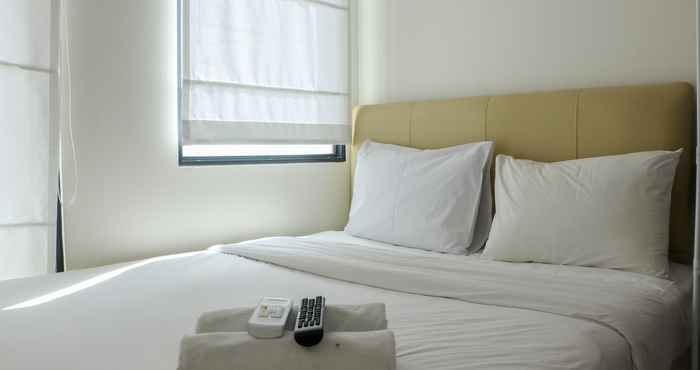 Kamar Tidur Tidy Studio and Modern Look (No Kitchen) Osaka Riverview PIK 2 Apartment By Travelio