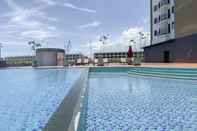 Swimming Pool Tidy Studio and Modern Look (No Kitchen) Osaka Riverview PIK 2 Apartment By Travelio