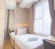 Kamar Tidur 2 Cozy Living and Comfort 2BR Apartment at Transpark Cibubur By Travelio