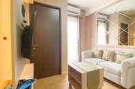 Common Space Cozy Living and Comfort 2BR Apartment at Transpark Cibubur By Travelio