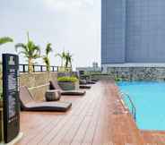 Swimming Pool 6 Modern and Nice 2BR at Bintaro Embarcadero Apartment By Travelio