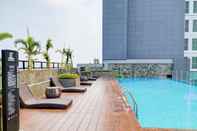 Swimming Pool Modern and Nice 2BR at Bintaro Embarcadero Apartment By Travelio