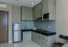 Common Space 3 Modern Look and Cozy 1BR at 22nd Floor Ciputra International Apartment By Travelio