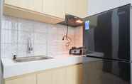 Ruang Umum 5 Modern and Comfort 2BR at Royal Heights Apartment By Travelio