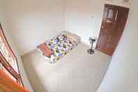 Bedroom JE Homestay Jogja by We Stay