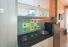 Common Space 5 Minimalist and Good Studio at Vivo Apartment By Travelio