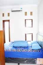 ห้องนอน 4 Maguwoharjo Street Homestay Jogja