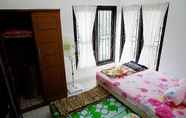 Kamar Tidur 2 Grand Purwomartani Homestay Jogja