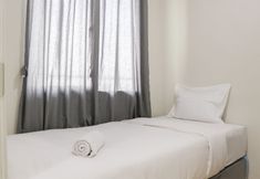 Bedroom 2 Comfort and Clean 2BR at Daan Mogot City Apartment By Travelio