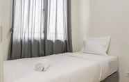 Bedroom 2 Comfort and Clean 2BR at Daan Mogot City Apartment By Travelio