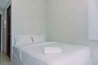 Kamar Tidur Elegant and Nice Studio at Transpark Bintaro Apartment By Travelio