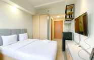 Bedroom 2 Nice and Minimalist Studio Apartment at Evenciio Margonda By Travelio