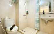 In-room Bathroom 5 Tidy and Pleasant Studio Apartment Springlake Summarecon Bekasi By Travelio